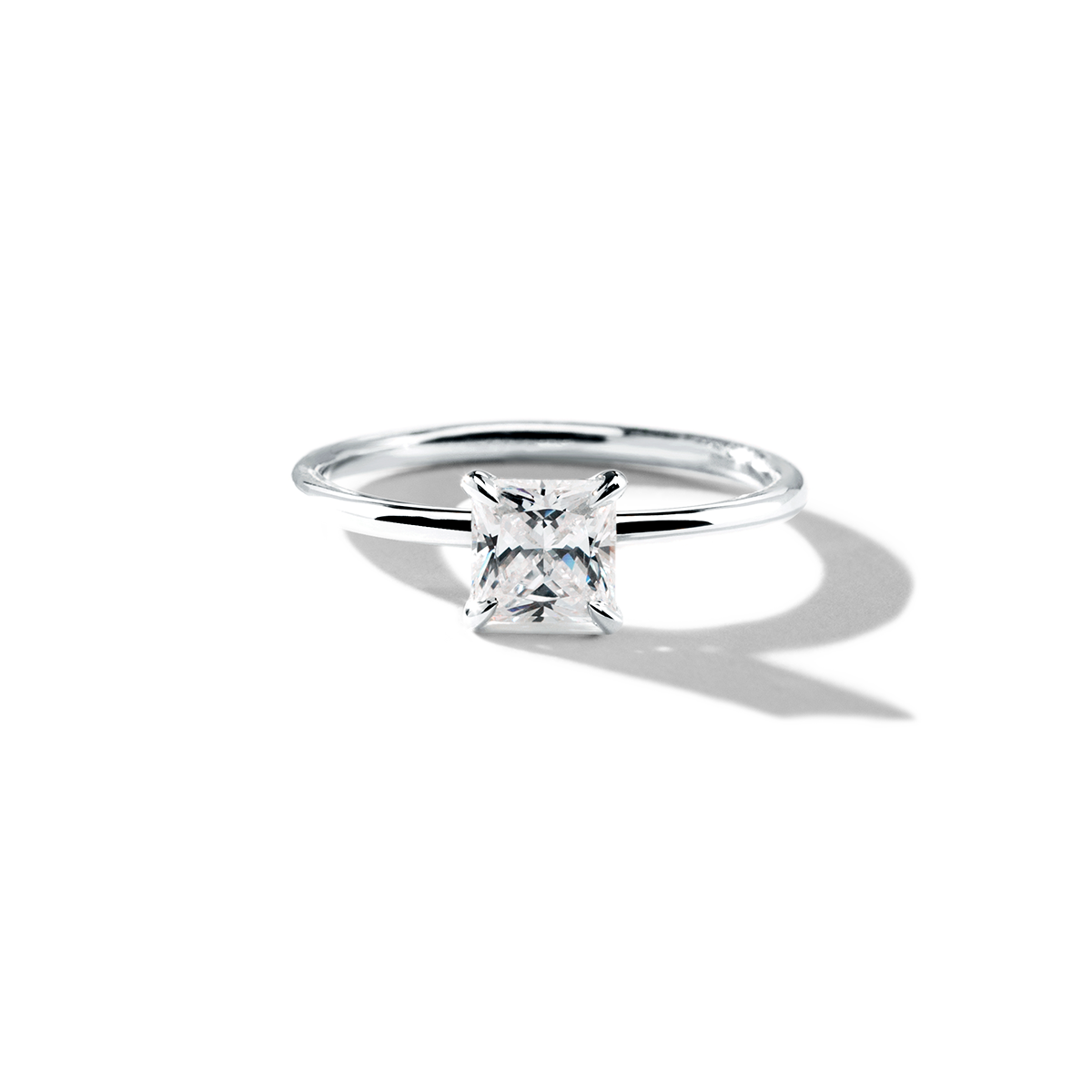 Solitaire with Hidden Halo Engagement Ring