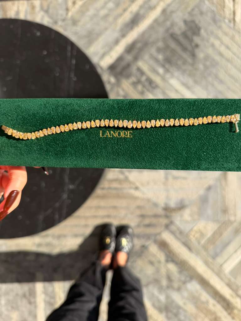 North/South Fancy Yellow Pear Cut LG Diamond Tennis Bracelet (12ctw)