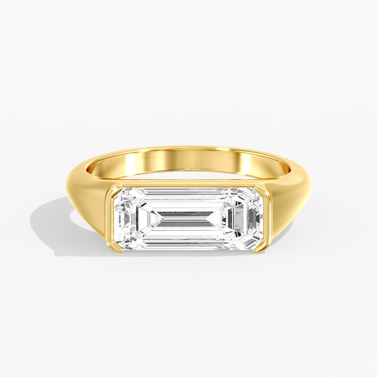 Elongated Emerald Cut Half Bezel Ring