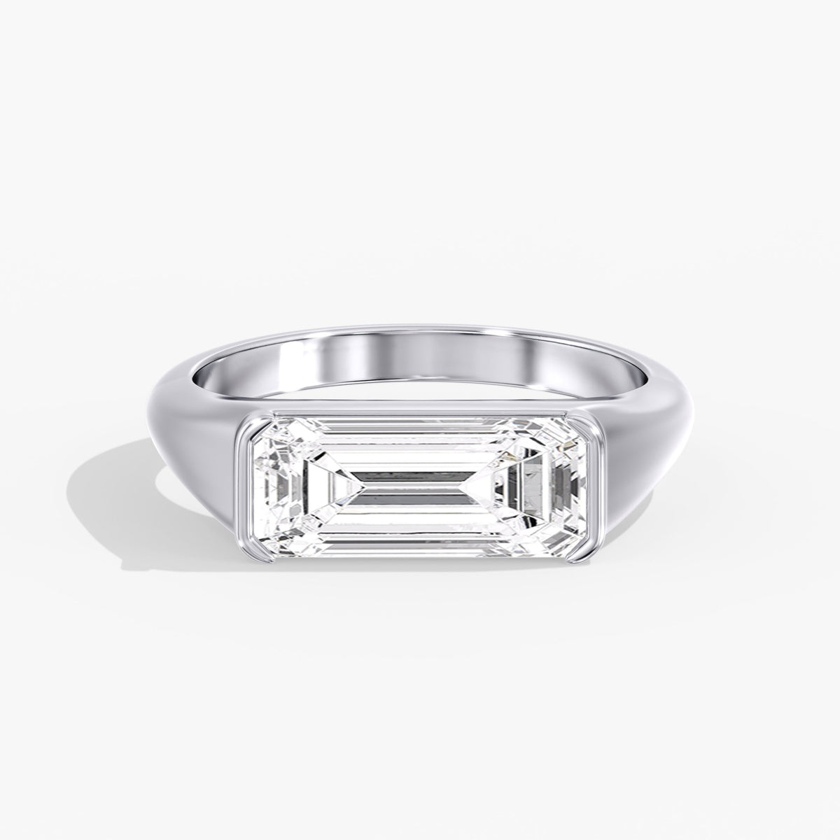 Elongated Emerald Cut Half Bezel Ring