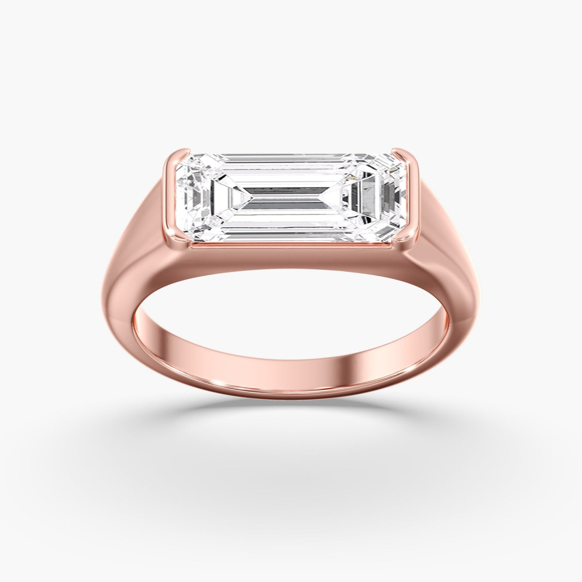 Elongated Emerald Cut Half Bezel Ring