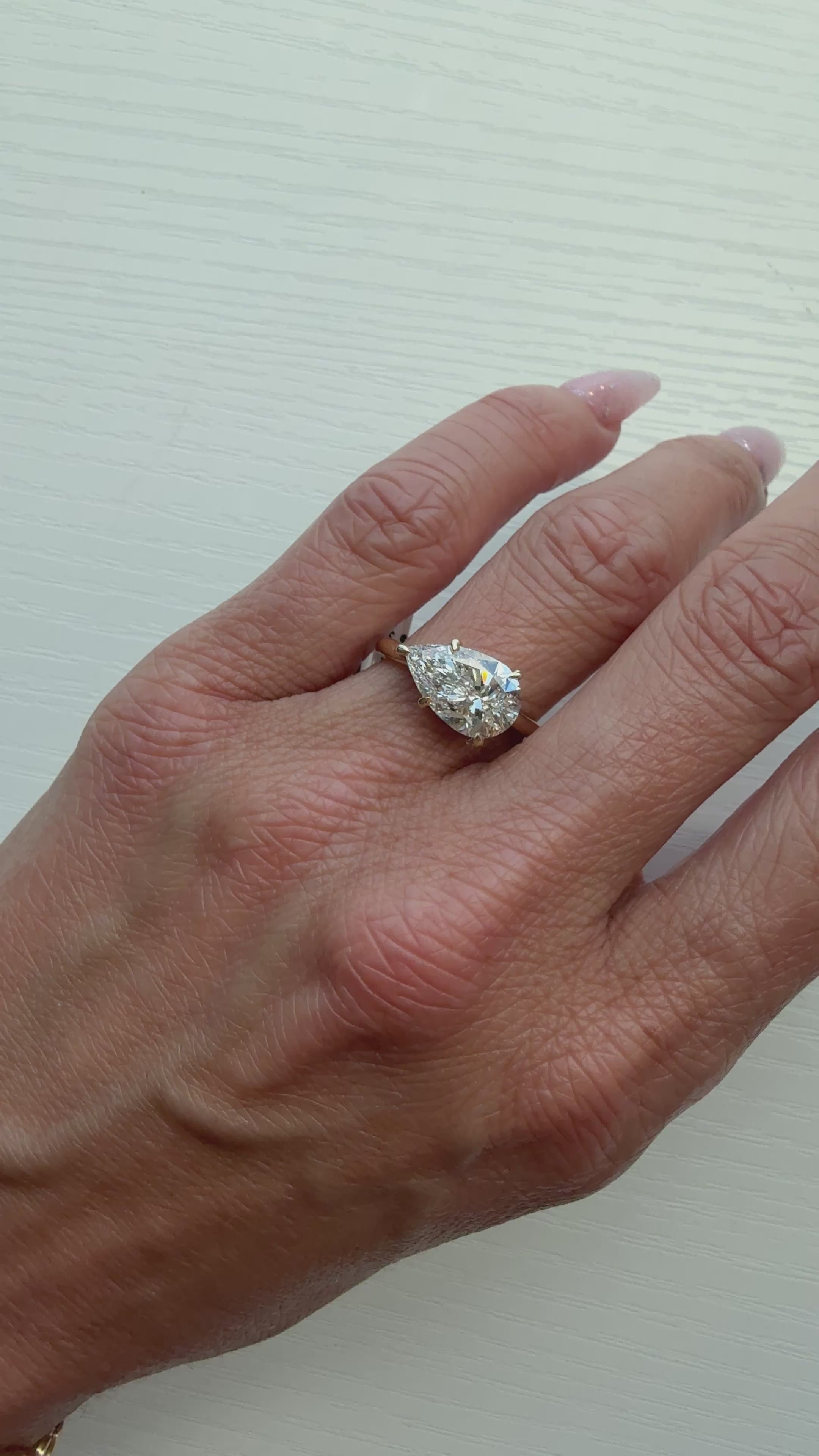 East/West Pear Cut London Engagement Ring with HH