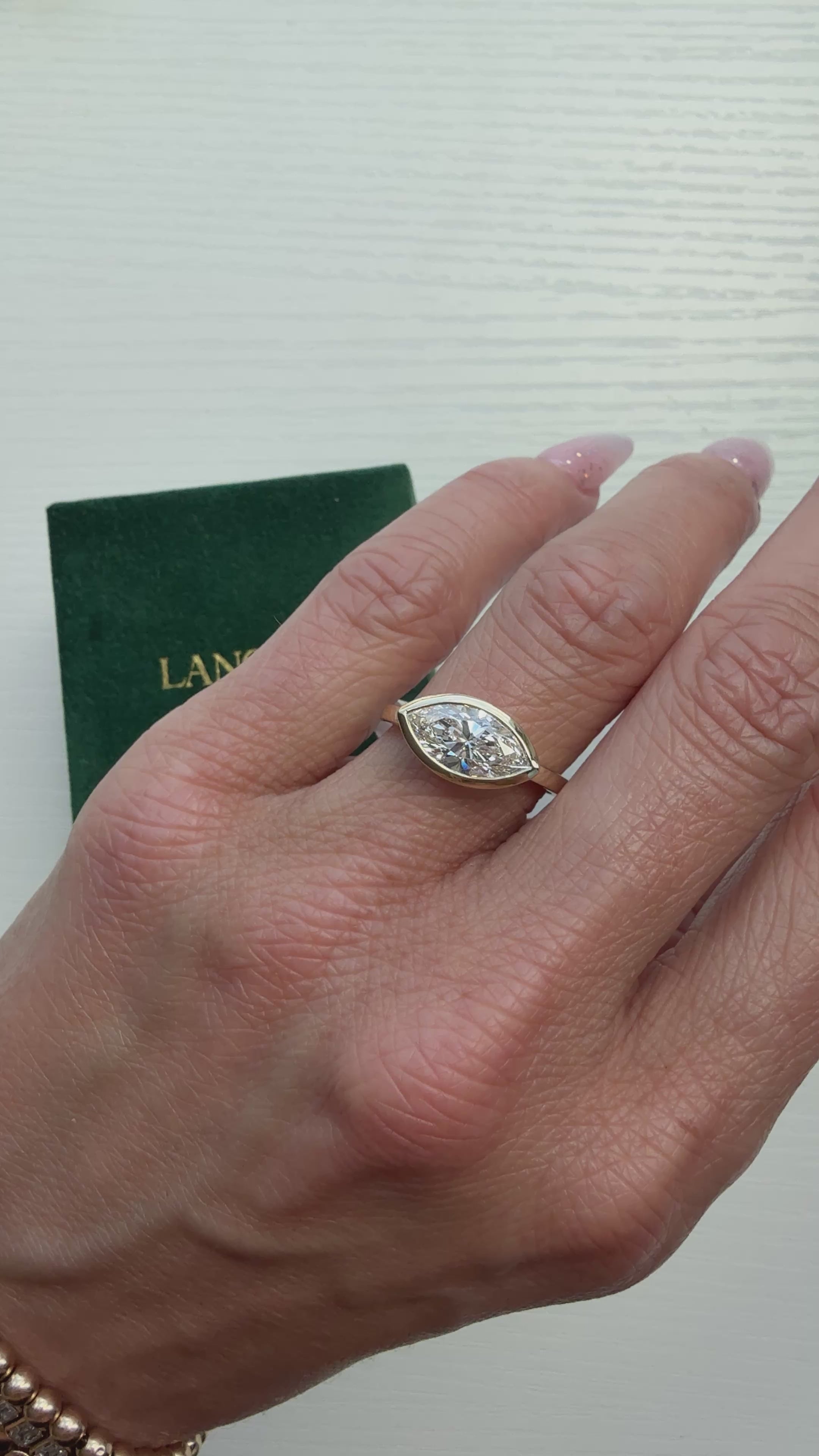 East/West Marquise Paris Engagement Ring